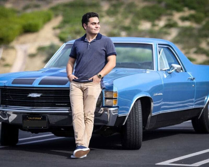 High School Senior Portrait: Senior Guy Leaning Against Chevy El Camino